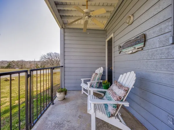 a front view of a building with garden