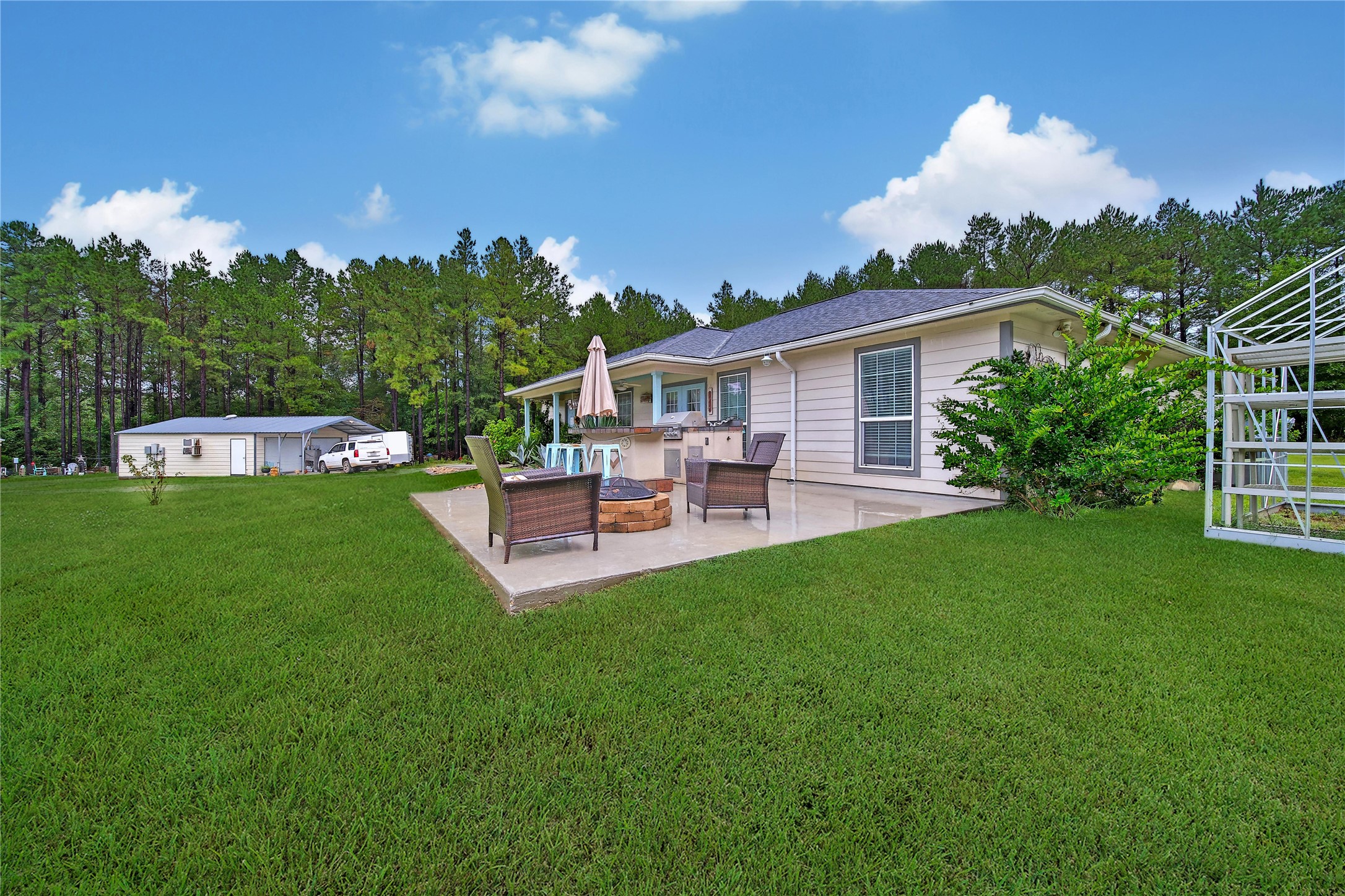 757 Big Woods Road New Waverly, TX 77358 - Photo 5 of 50 Beautiful view of the back porch!