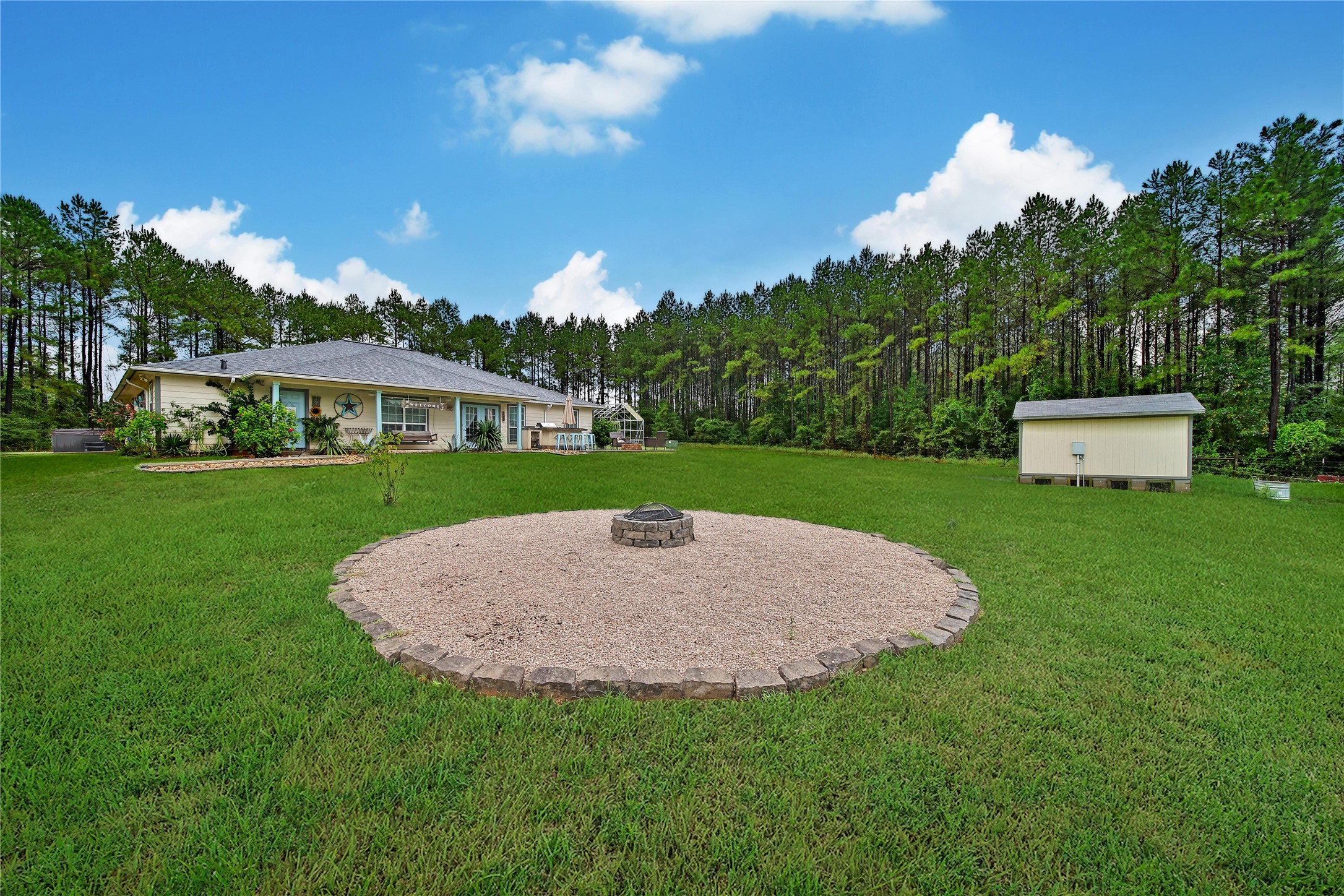 757 Big Woods Road New Waverly, TX 77358 - Photo 9 of 50 a view of outdoor space yard and house