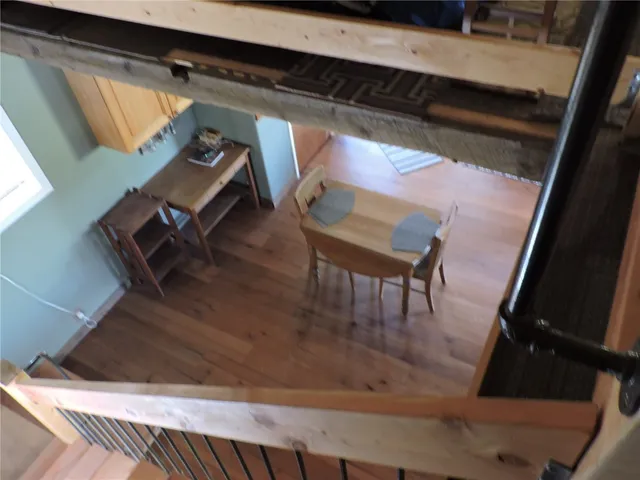 view of living room with chair and wooden floor