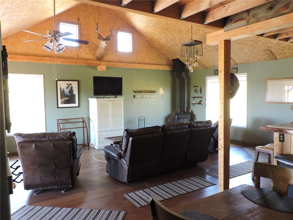 16 Buckshot Trail Como, CO 80432 - Photo 15 of 46 a living room with furniture and a flat screen tv