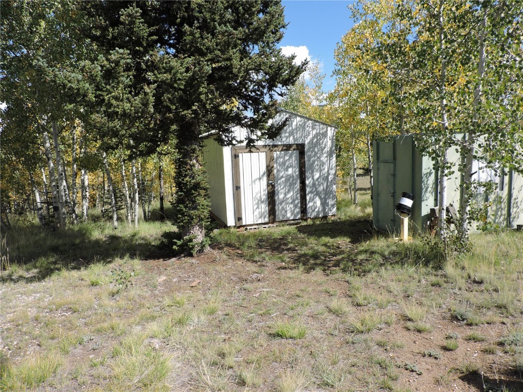 16 Buckshot Trail Como, CO 80432 - Photo 32 of 46 a view of a house with a yard