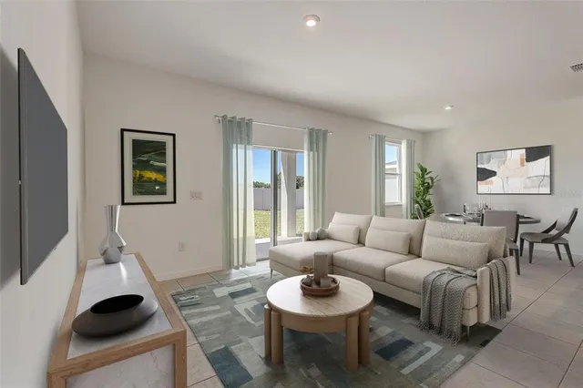 a living room with furniture and a window