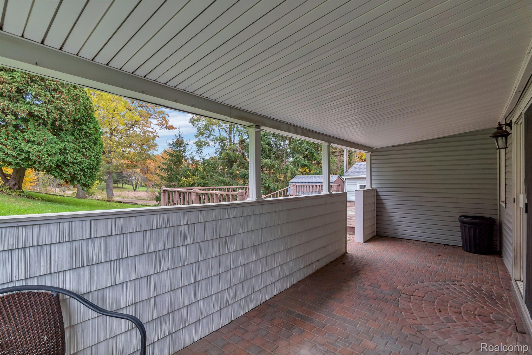 16068 Fish Lake Road Holly, MI 48442 - Photo 36 of 44 Covered porch opens to large deck