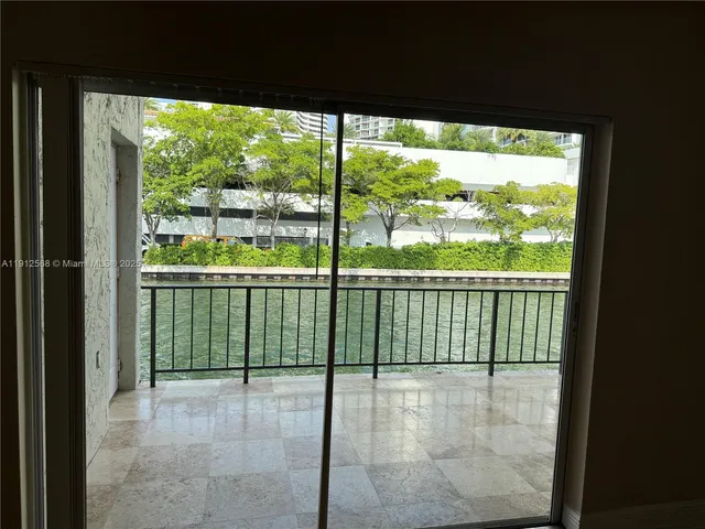 a view of a large window with an outdoor space