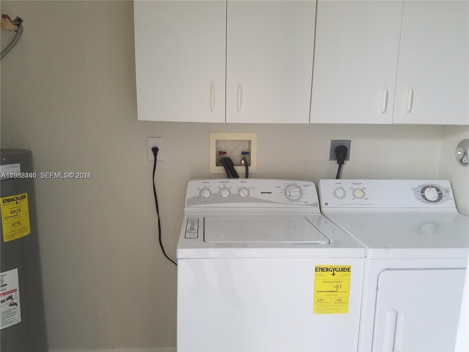 18741 Southwest 25th Court Miramar, FL 33029 - Photo 14 of 32 a utility room with dryer and washer