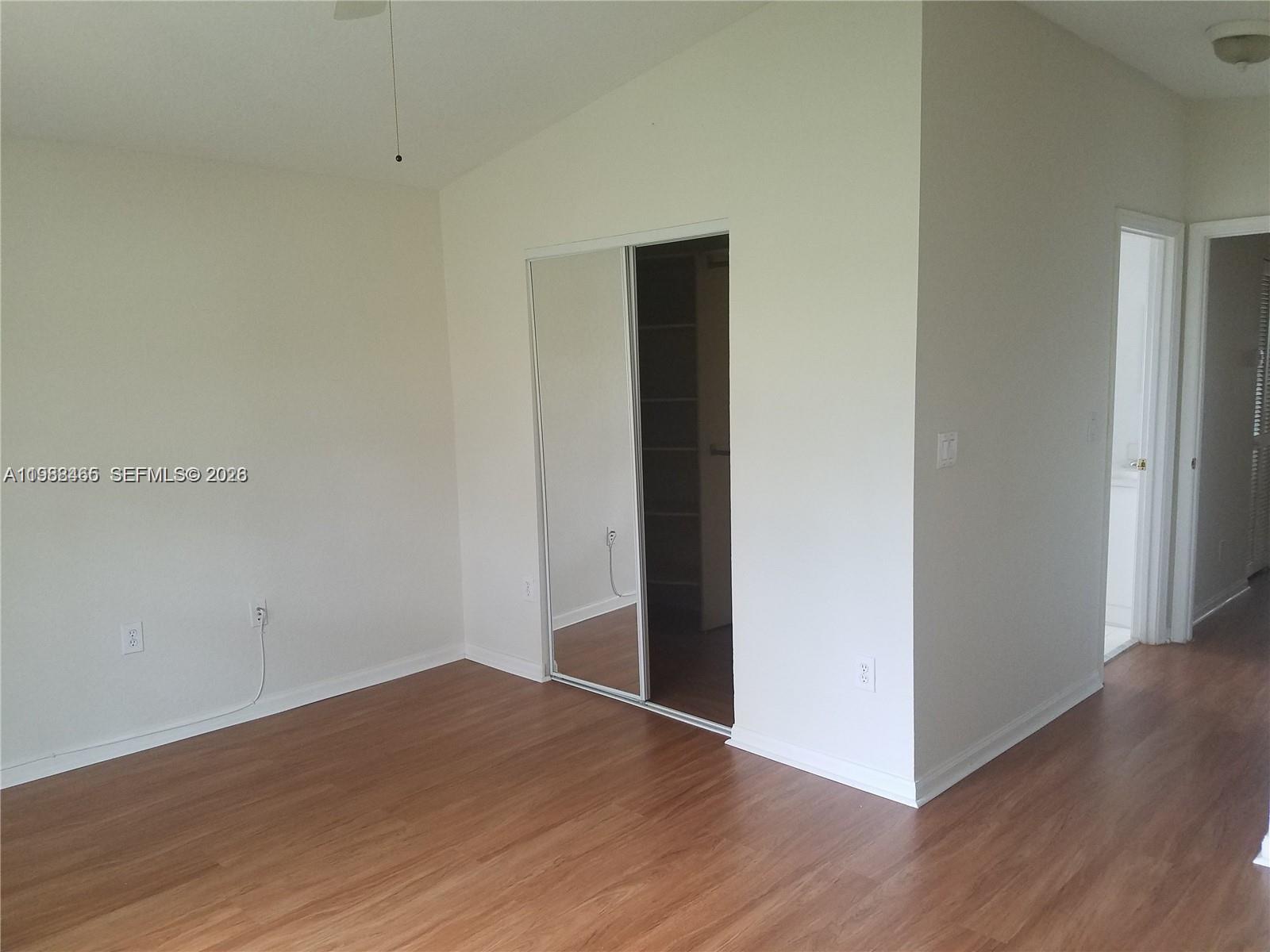 18741 Southwest 25th Court Miramar, FL 33029 - Photo 20 of 32 a view of a room with wooden floor