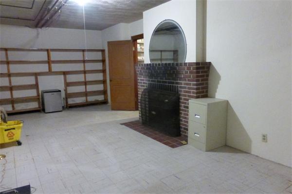 305 Sterling Road Lancaster, MA 01523 - Photo 18 of 21 a view of an empty room with a fireplace