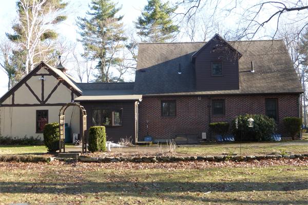 305 Sterling Road Lancaster, MA 01523 - Photo 20 of 21 a front view of a house with garden