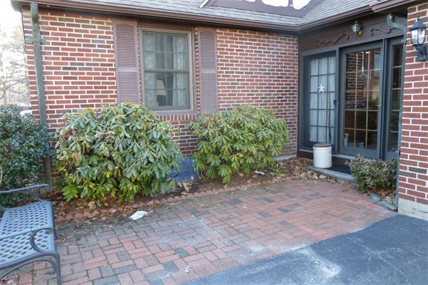 305 Sterling Road Lancaster, MA 01523 - Photo 2 of 21 a front view of a house with a yard