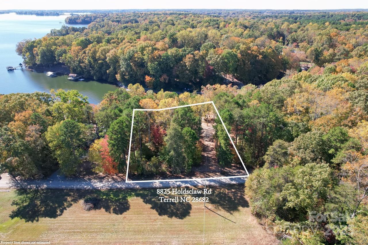 8825 Holdsclaw Road Terrell, NC 28682 - Photo 14 of 33 a view of a yard with wooden fence