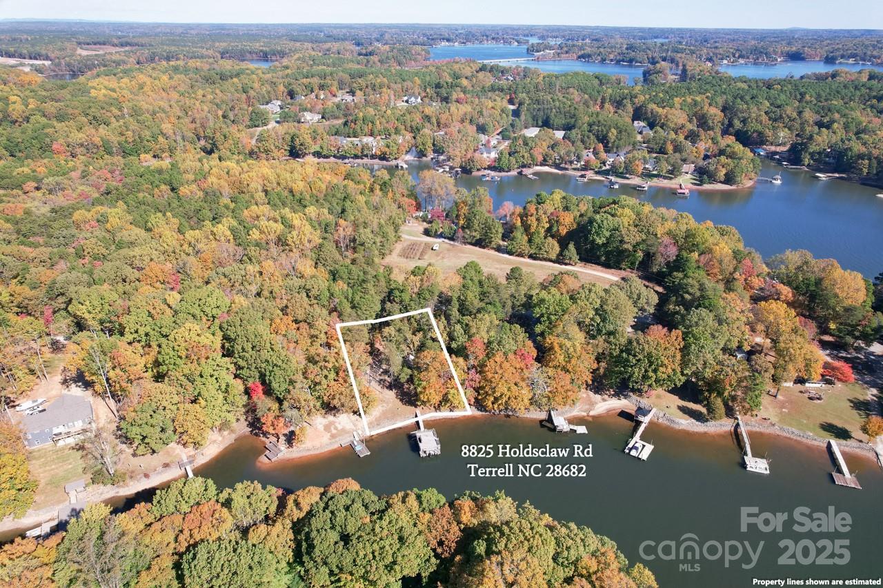 8825 Holdsclaw Road Terrell, NC 28682 - Photo 17 of 33 an aerial view of residential houses with outdoor space