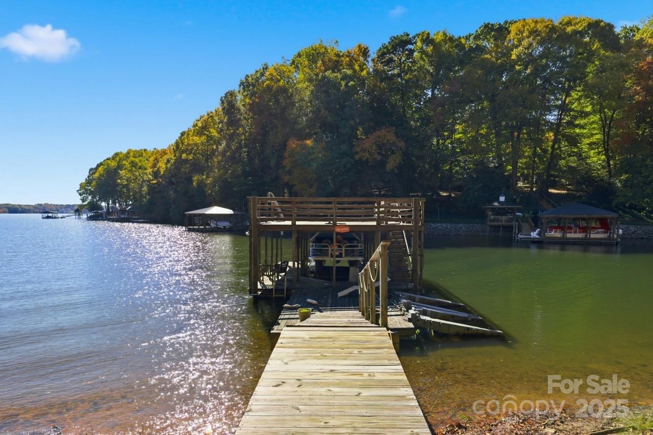 8825 Holdsclaw Road Terrell, NC 28682 - Photo 5 of 33 a view of a patio with chairs and a table