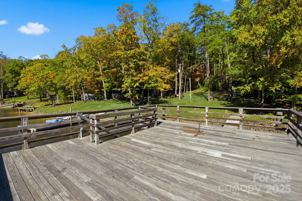 8825 Holdsclaw Road Terrell, NC 28682 - Photo 8 of 33 a view of a tennis ground with trees in the background