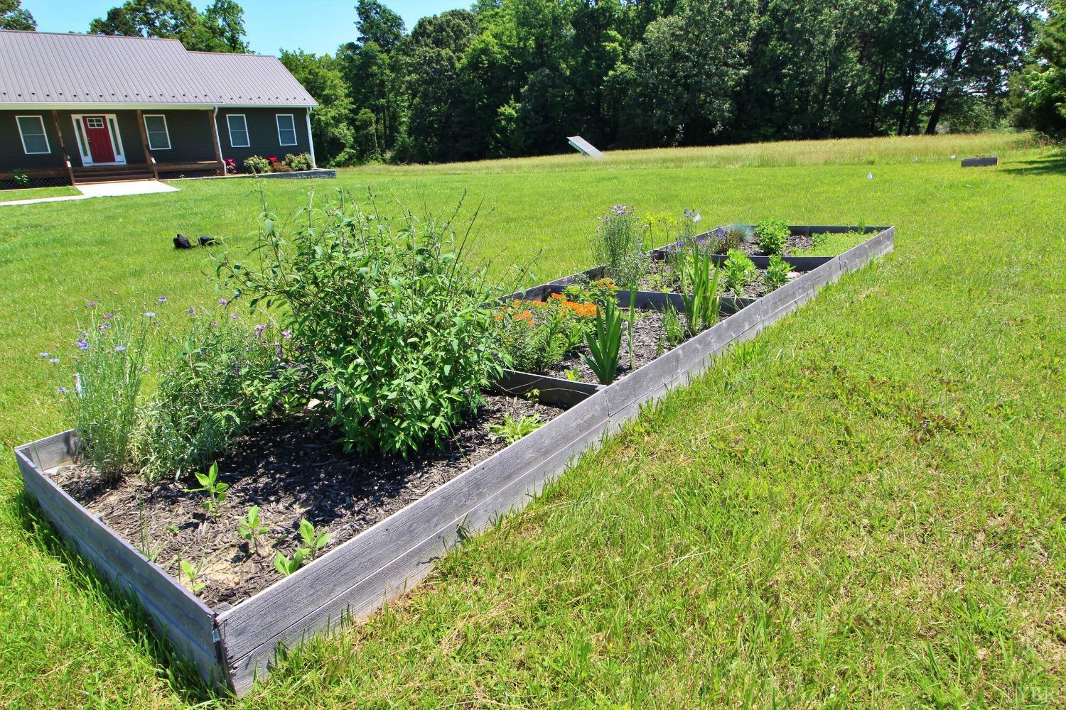 1908 Rosney Road Dillwyn, VA 23936 - Photo 47 of 47 a view of a backyard with garden