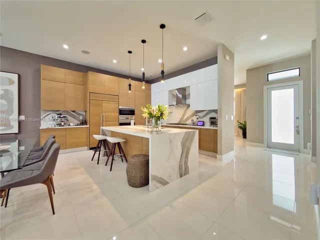 a living room with furniture and a painting