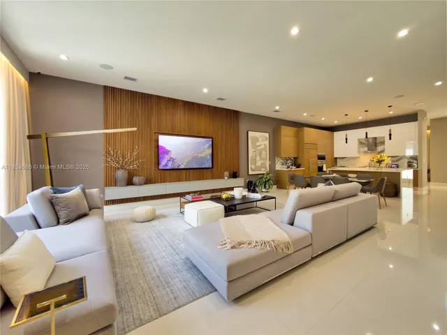 a spacious bedroom with a bed and a large window