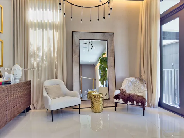 a spacious bathroom with a double vanity sink and a mirror