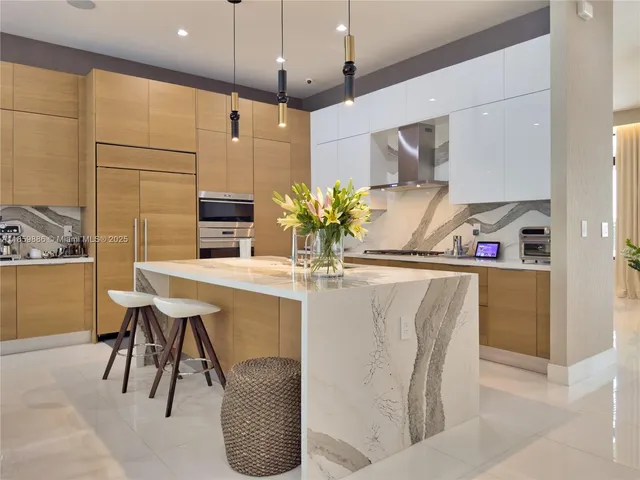 a bed room with furniture and a chandelier