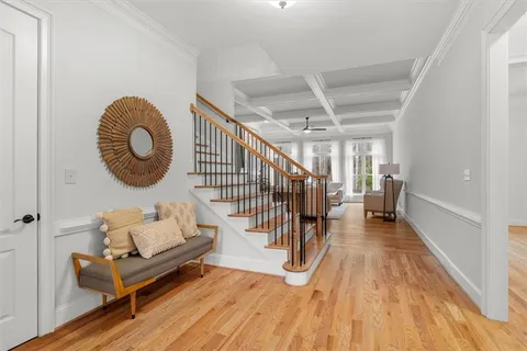 a bathroom with a granite countertop shower and vanity