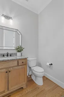 a bathroom with a bathtub a sink a toilet and a mirror