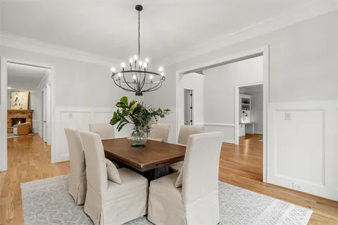 a workspace with furniture window and wooden floor