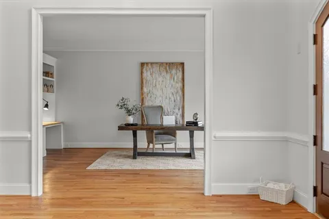 a living room with furniture and a table