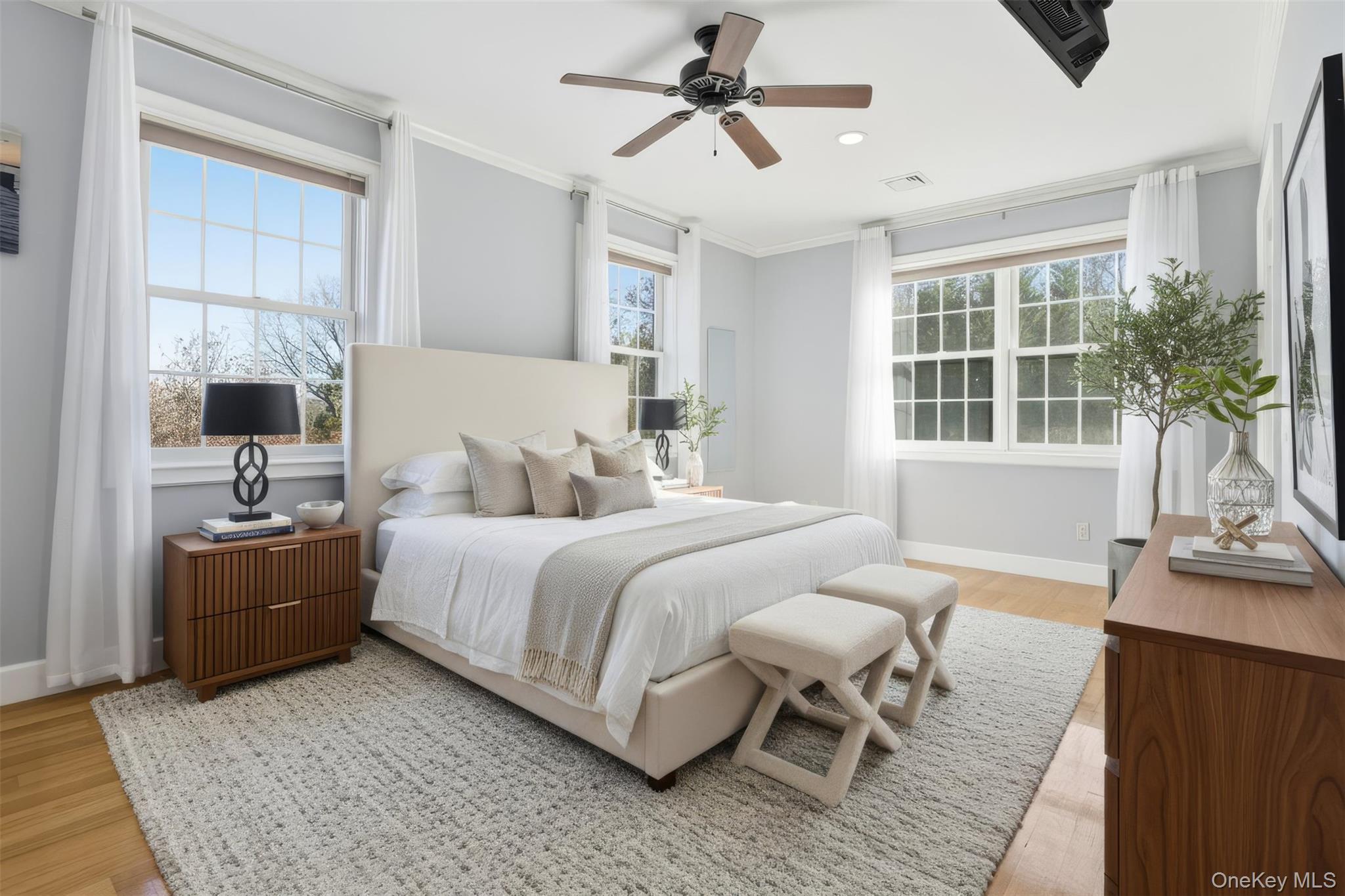 33 A Newtown Road Hampton Bays, NY 11946 - Photo 32 of 50 Bedroom with crown molding, ceiling fan, light wood-type flooring, and recessed lighting