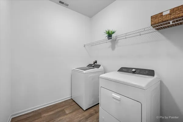 a utility room with dryer and washer