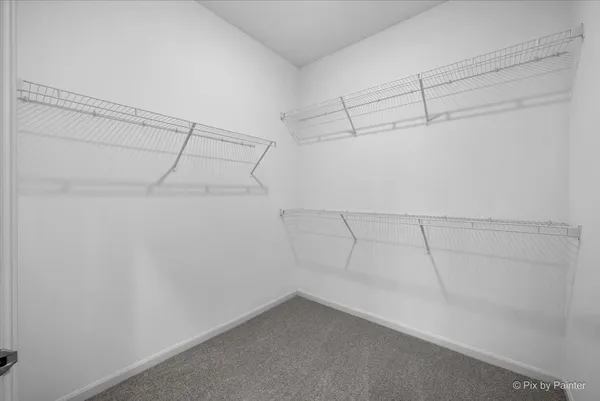 a view of a room with racks on the wall