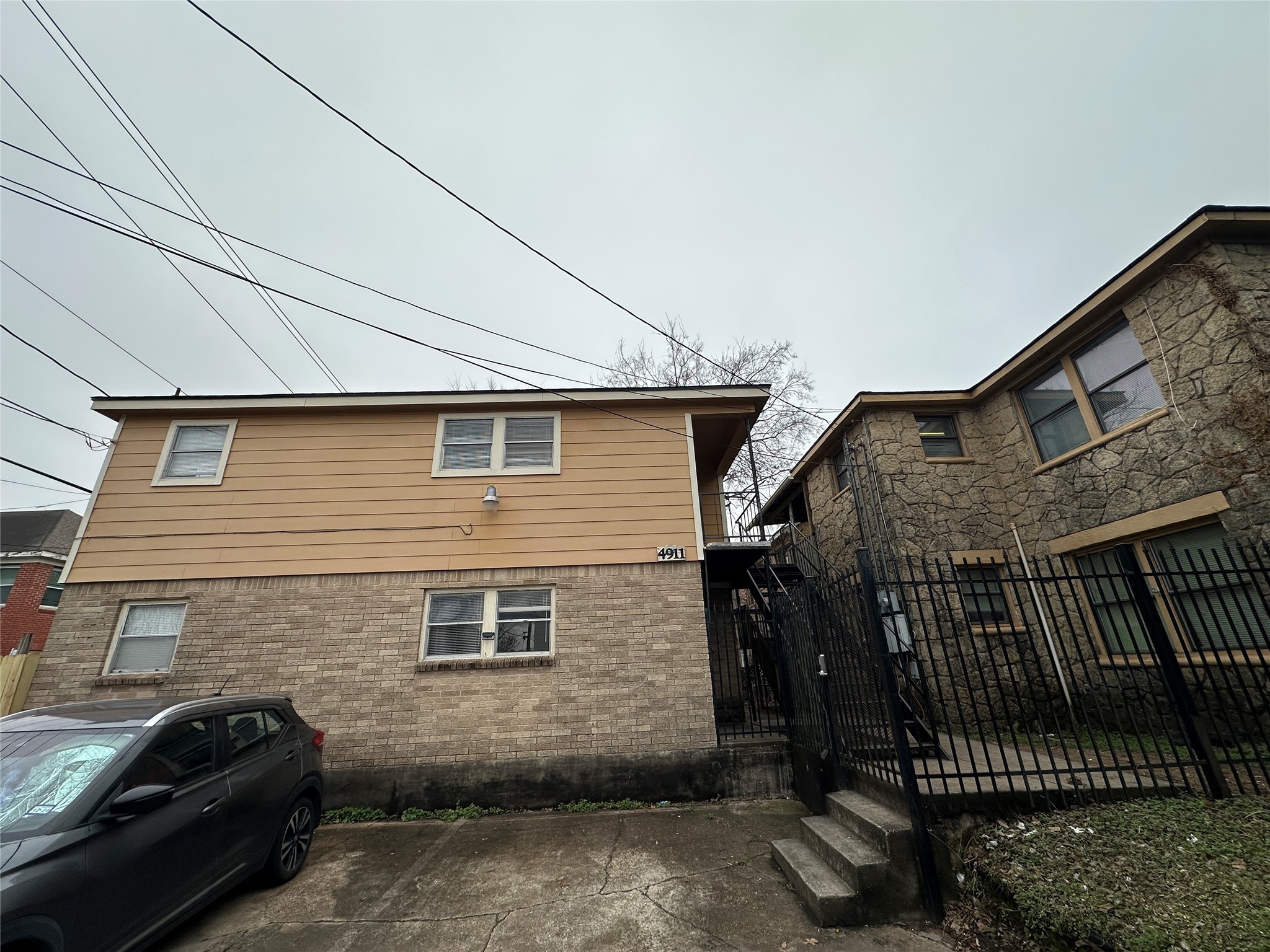 4911 Delano Street, Unit 2 Houston, TX 77004 - Photo 11 of 13 a view of a house with a yard