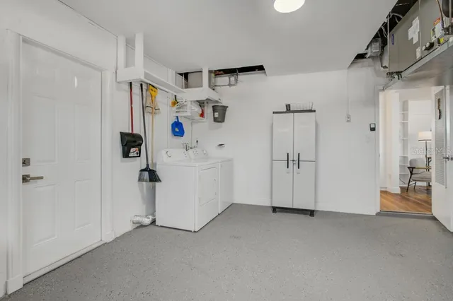 a view of a room with white walls