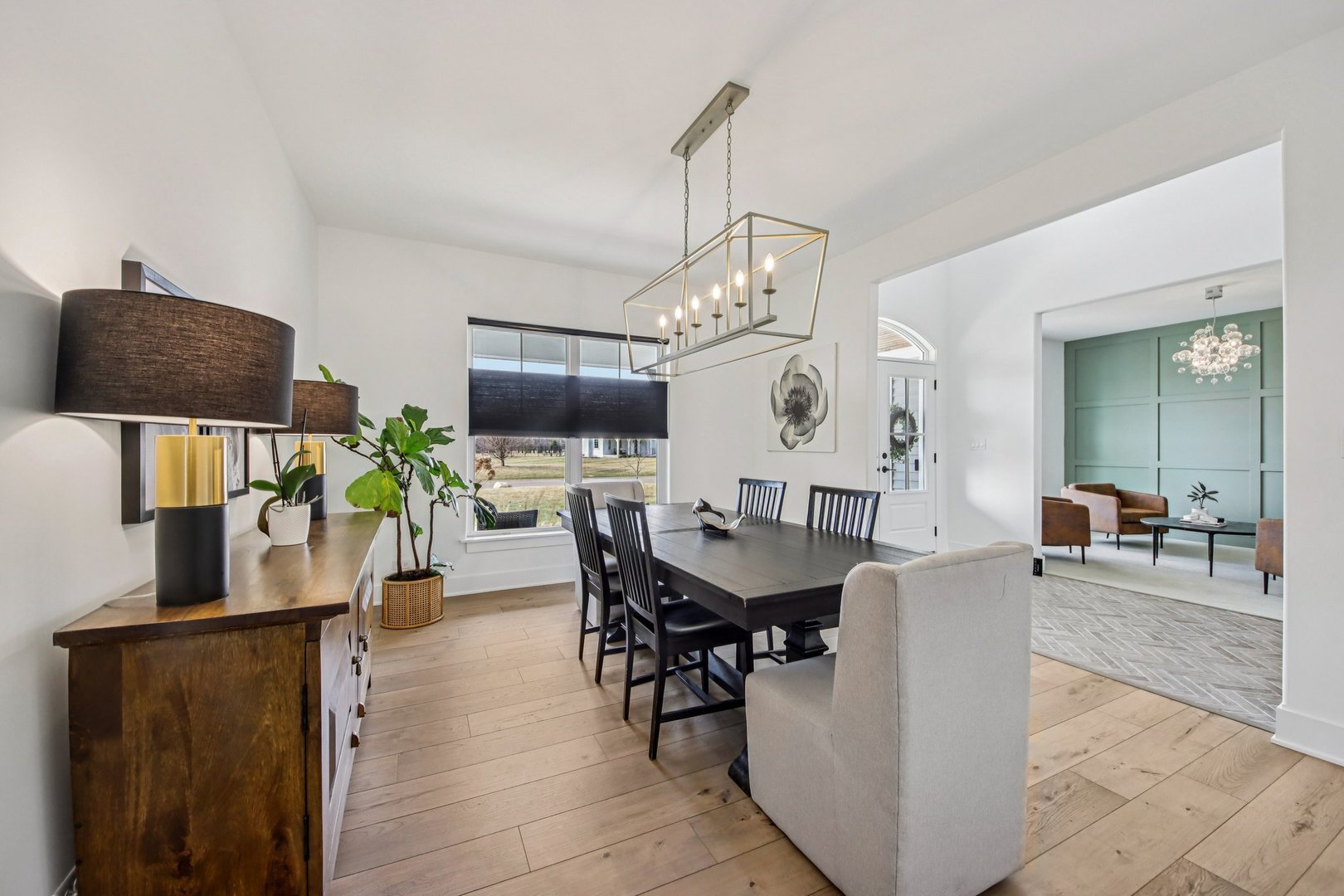 3276 Cornflower Way Spring Grove, IL 60081 - Photo 13 of 48 a view of a dining room with furniture and wooden floor
