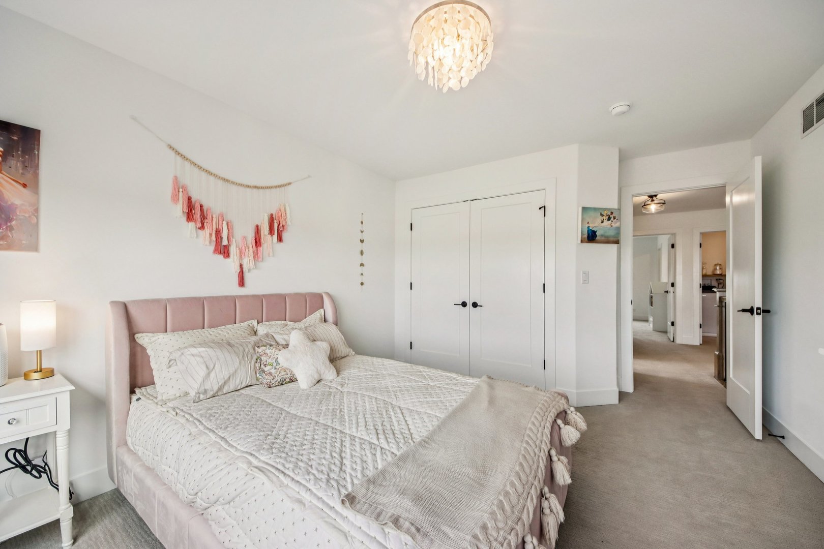 3276 Cornflower Way Spring Grove, IL 60081 - Photo 27 of 48 a bedroom with a bed and a chandelier