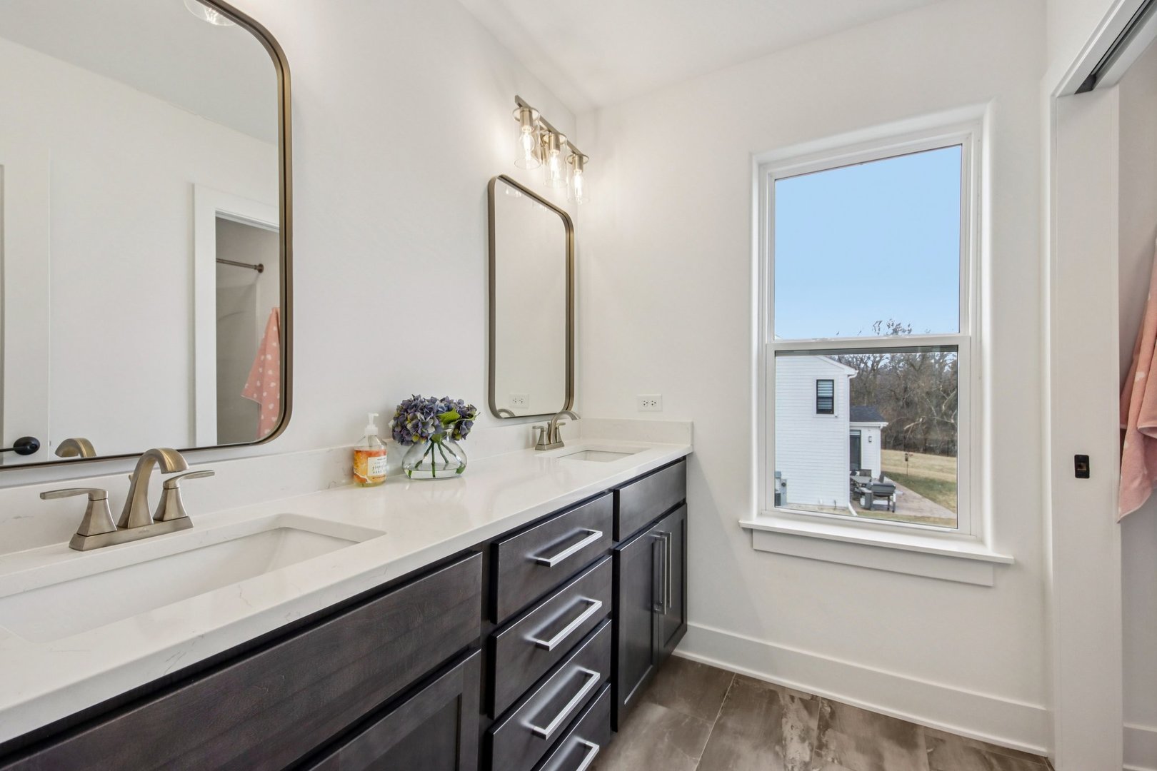 3276 Cornflower Way Spring Grove, IL 60081 - Photo 32 of 48 a bathroom with a double vanity sink and a mirror