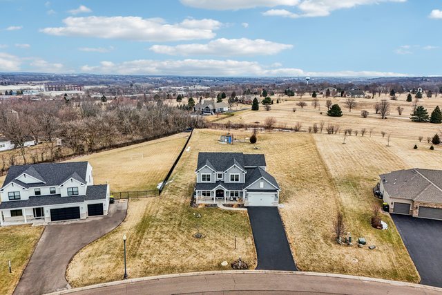3276 Cornflower Way Spring Grove, IL 60081 - Photo 44 of 48 a view of a city with lawn chairs