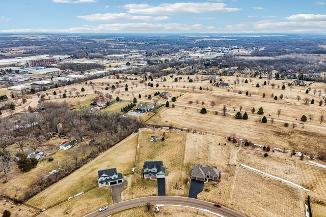 3276 Cornflower Way Spring Grove, IL 60081 - Photo 45 of 48 an aerial view of residential houses with outdoor space