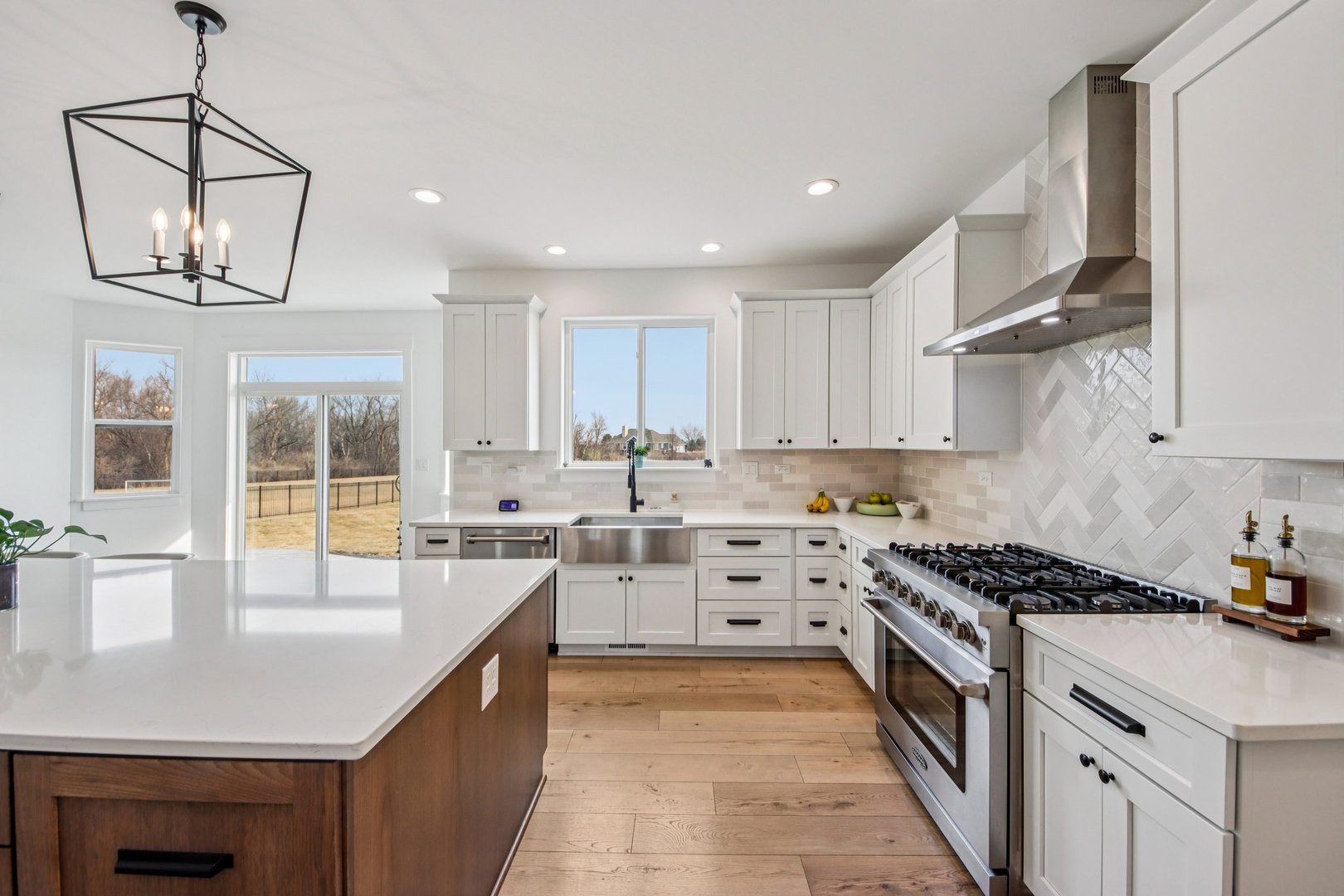 3276 Cornflower Way Spring Grove, IL 60081 - Photo 7 of 48 a kitchen with stainless steel appliances a stove sink and cabinets