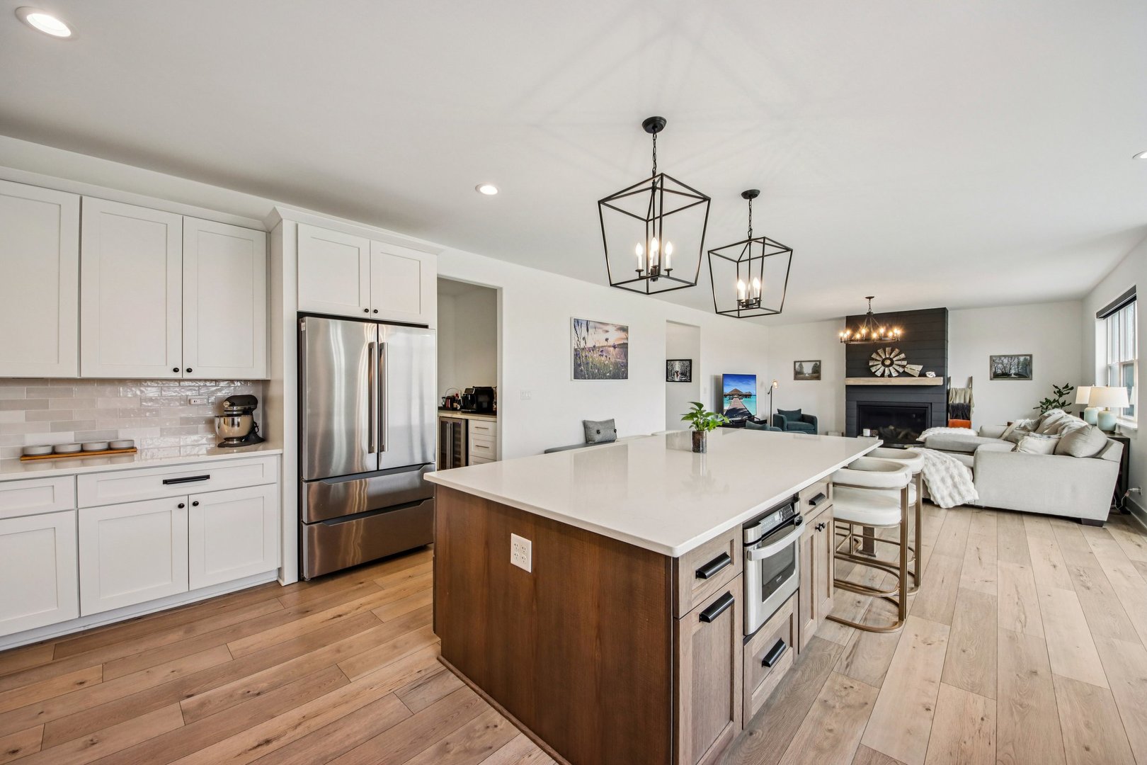 3276 Cornflower Way Spring Grove, IL 60081 - Photo 8 of 48 a kitchen that has a lot of cabinets a sink and wooden floor