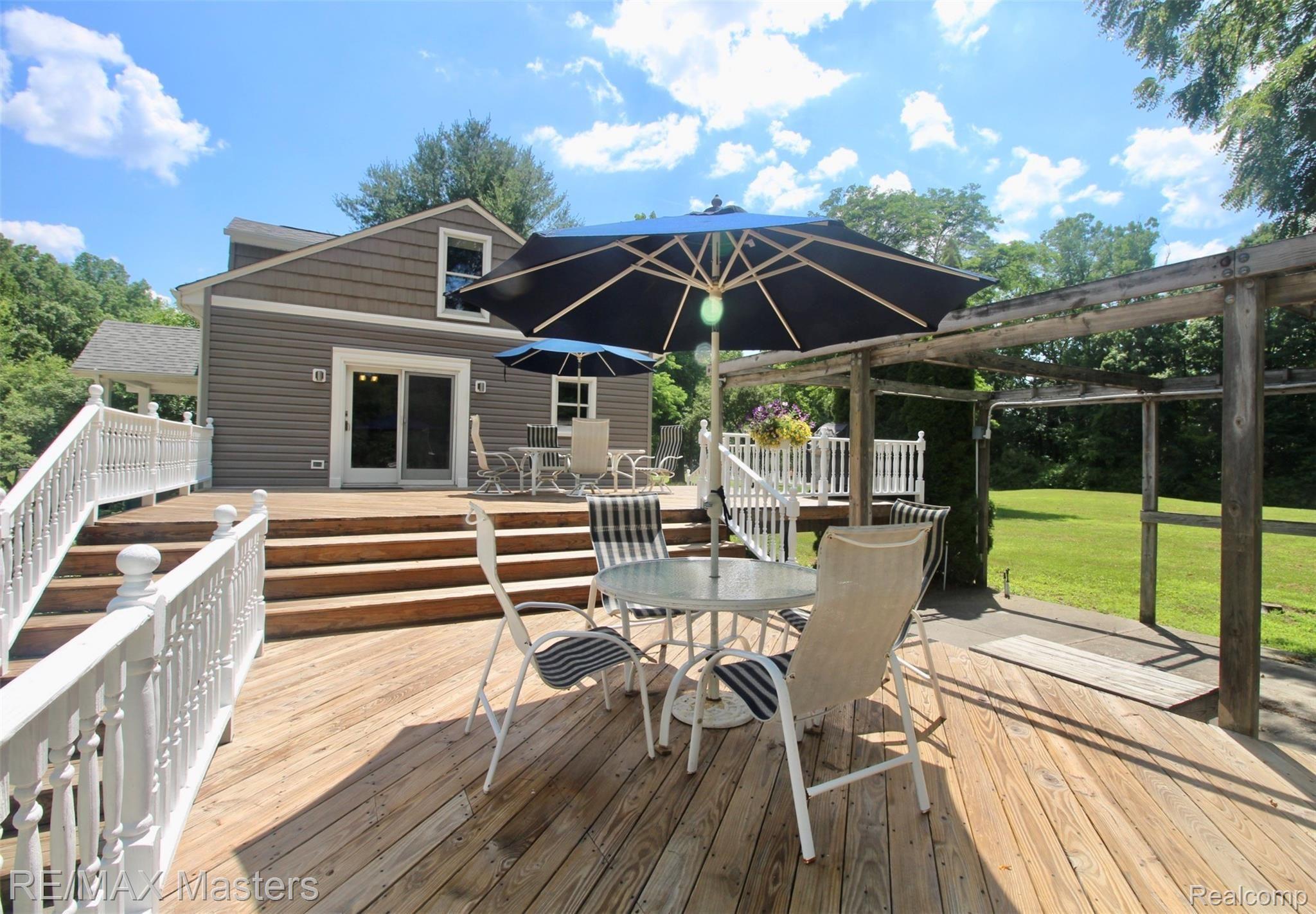32430 King Road New Boston, MI 48164 - Photo 23 of 36 Enjoy spacious decks, one is 15 x 14 and the other is 30 x 18...perfect for entertaining, gardening, peaceful away space, outdoor kitchen and more!