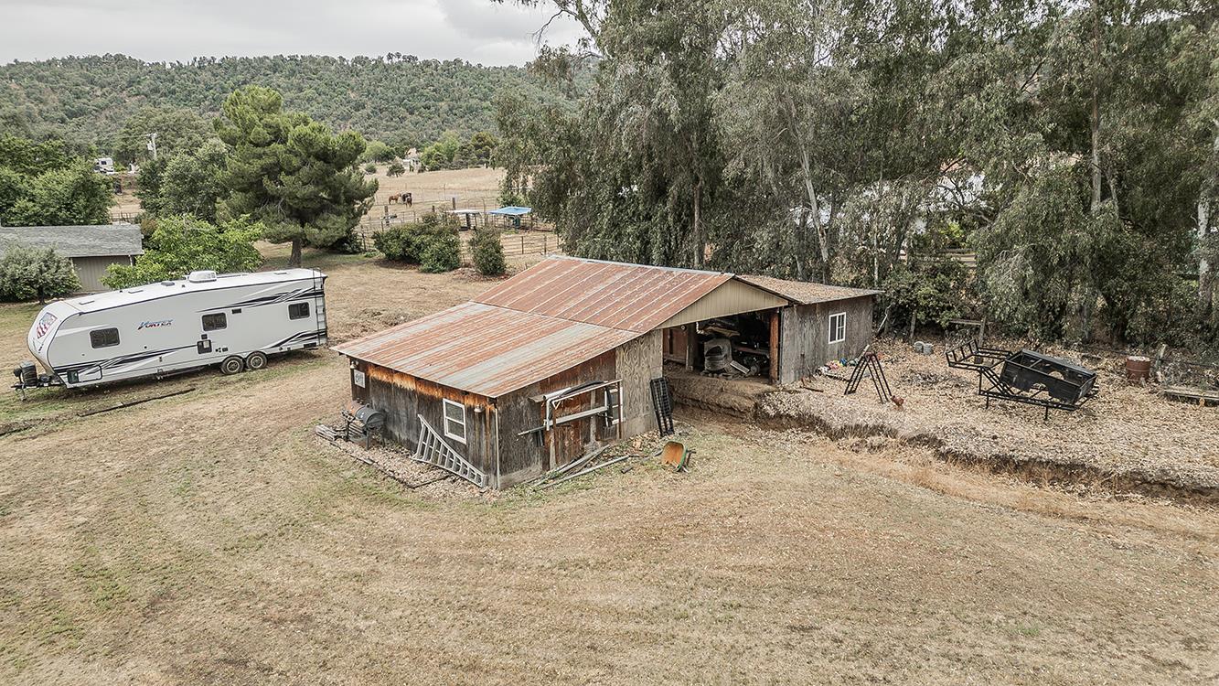 29545 Oak Meadow Road Tollhouse, CA 93667 - Photo 65 of 69 an aerial view of a house with a yard table and chairs