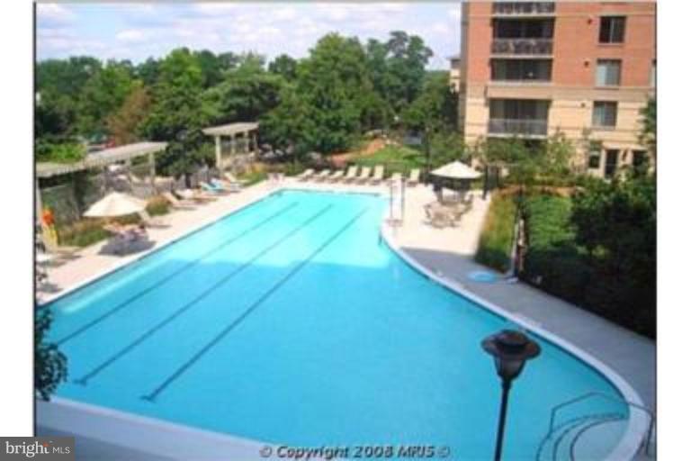 11710 Old Georgetown Road, Unit 408 Rockville, MD 20852 - Photo 26 of 27 a view of a balcony with chairs