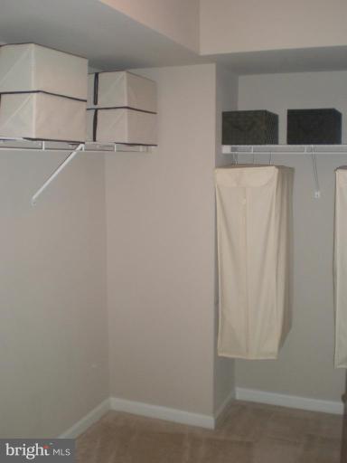 11710 Old Georgetown Road, Unit 408 Rockville, MD 20852 - Photo 4 of 27 a view of small space with racks on the wall