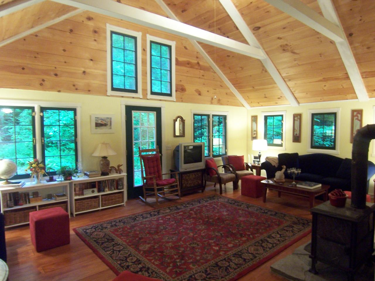 169 Bailey Hill Road Readsboro, VT 05350 - Photo 2 of 7 a living room with furniture rug and a table