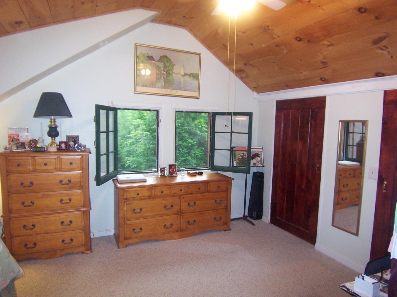 169 Bailey Hill Road Readsboro, VT 05350 - Photo 6 of 7 a bed room with a bed and a window