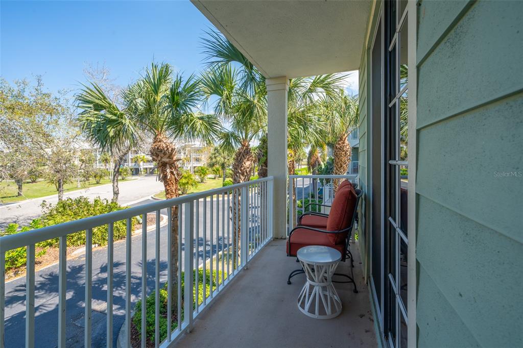 3230 Mangrove Point Drive Ruskin, FL 33570 - Photo 16 of 44 a view of balcony with furniture and city view