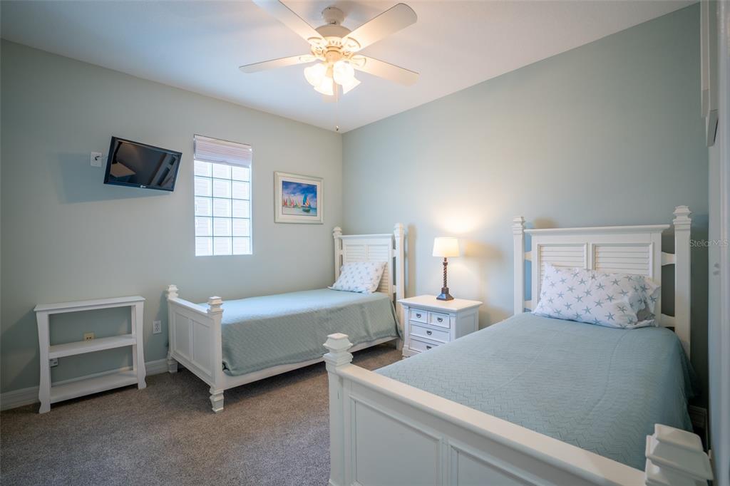 3230 Mangrove Point Drive Ruskin, FL 33570 - Photo 31 of 44 a bedroom with a bed and a window