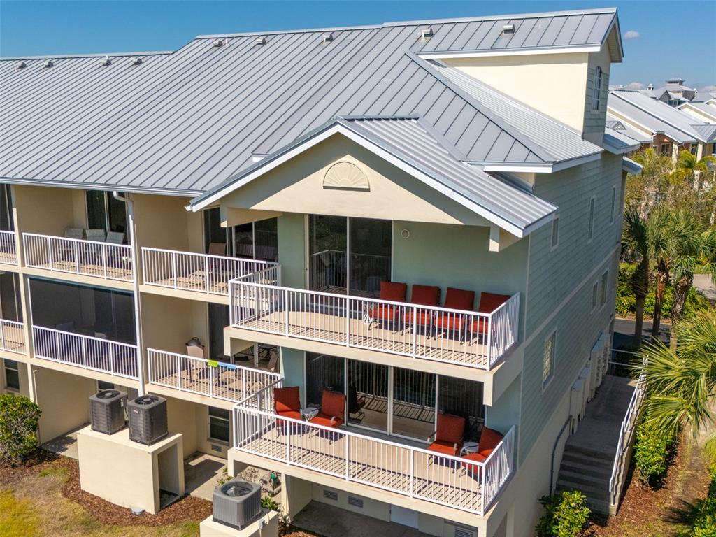 3230 Mangrove Point Drive Ruskin, FL 33570 - Photo 32 of 44 a view of house with a large window and potted plants