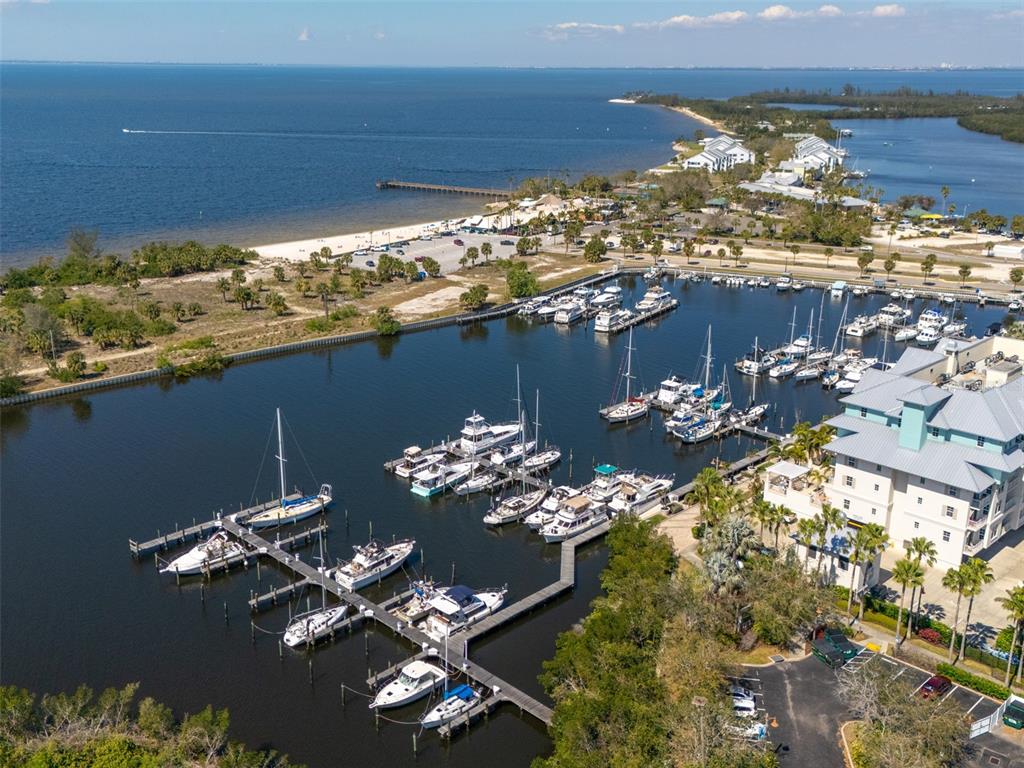 3230 Mangrove Point Drive Ruskin, FL 33570 - Photo 35 of 44 a view of a balcony with chairs and flower plants