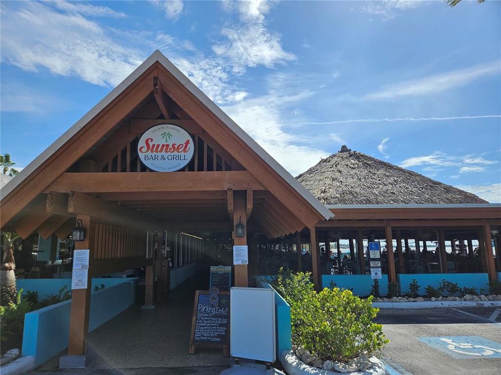 3230 Mangrove Point Drive Ruskin, FL 33570 - Photo 44 of 44 a front view of a building with sign board